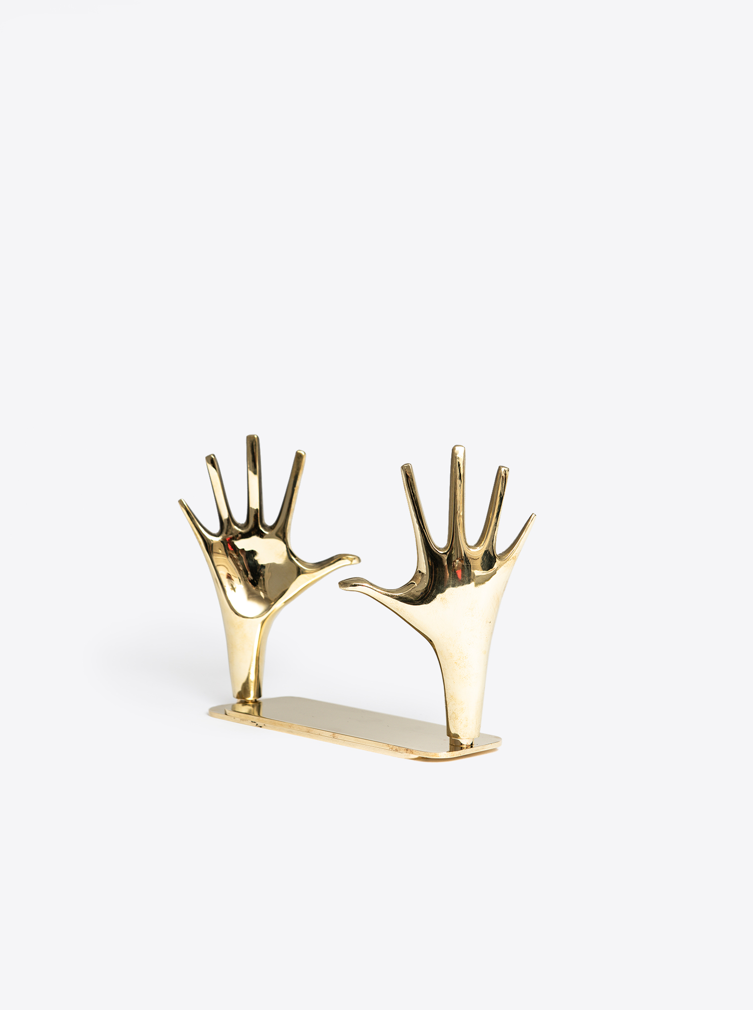 Bookend &quot;Hand&quot; 360 ° rotatable I polished brass