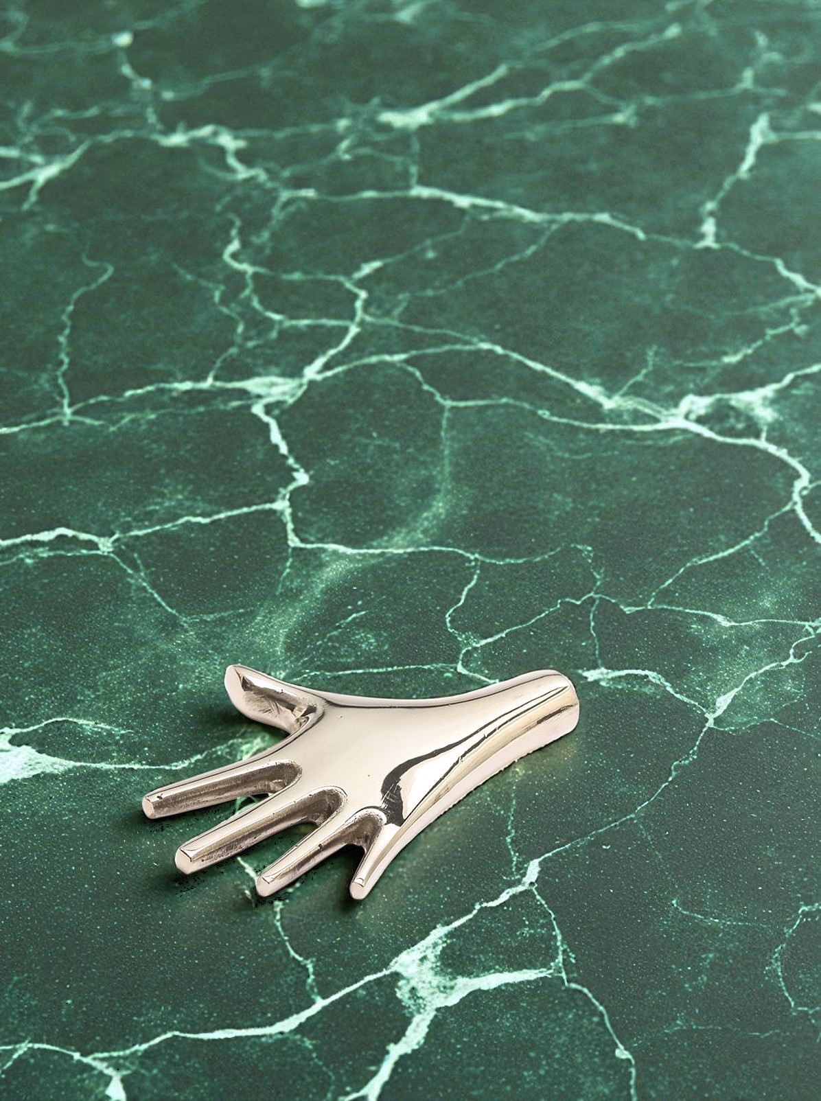 Paperweight &quot;Hand&quot; Brass polished