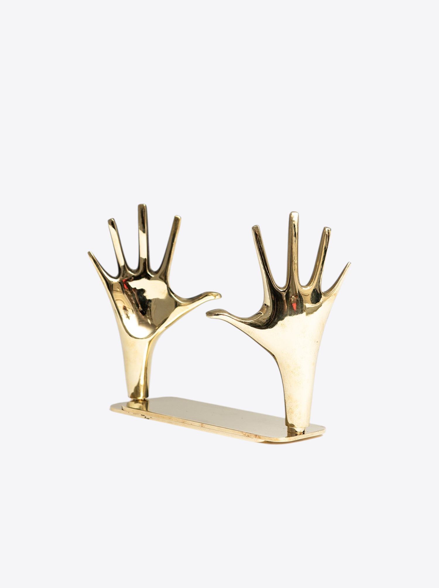 Bookend "Hand" 360 ° rotatable I polished brass