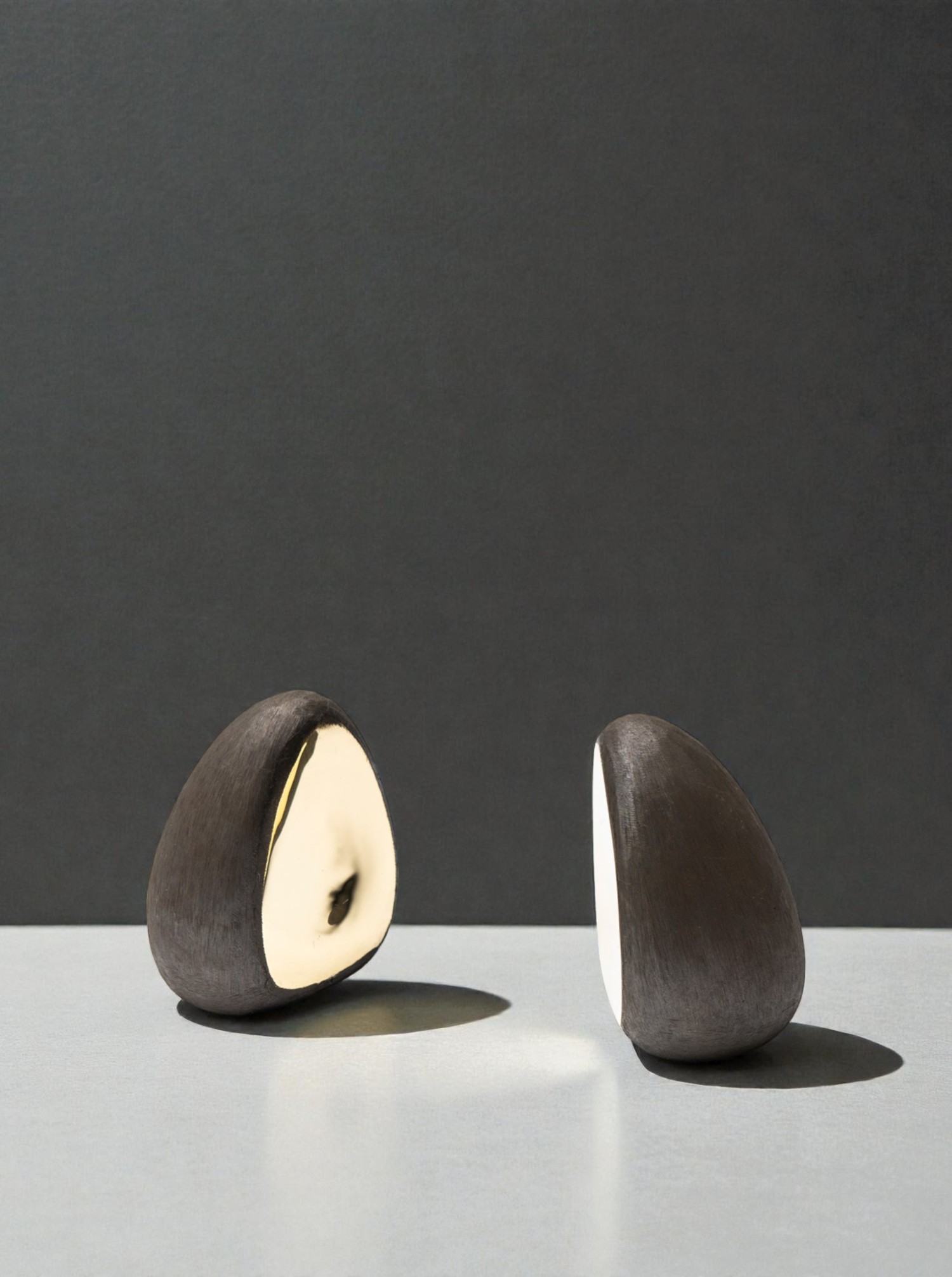 Bookend Set "Drop" Brass patinated and polished