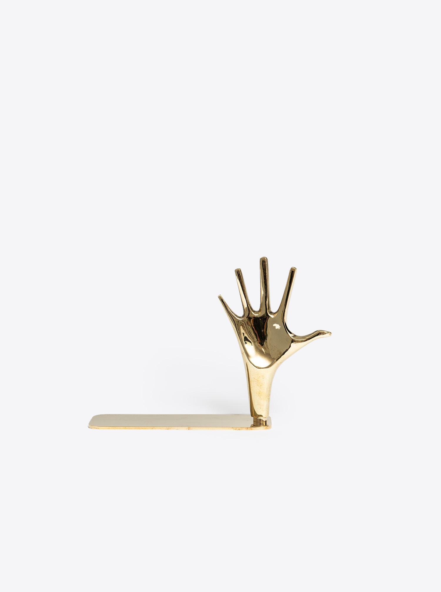 Bookend &quot;Hand&quot; 360 ° rotatable I polished brass