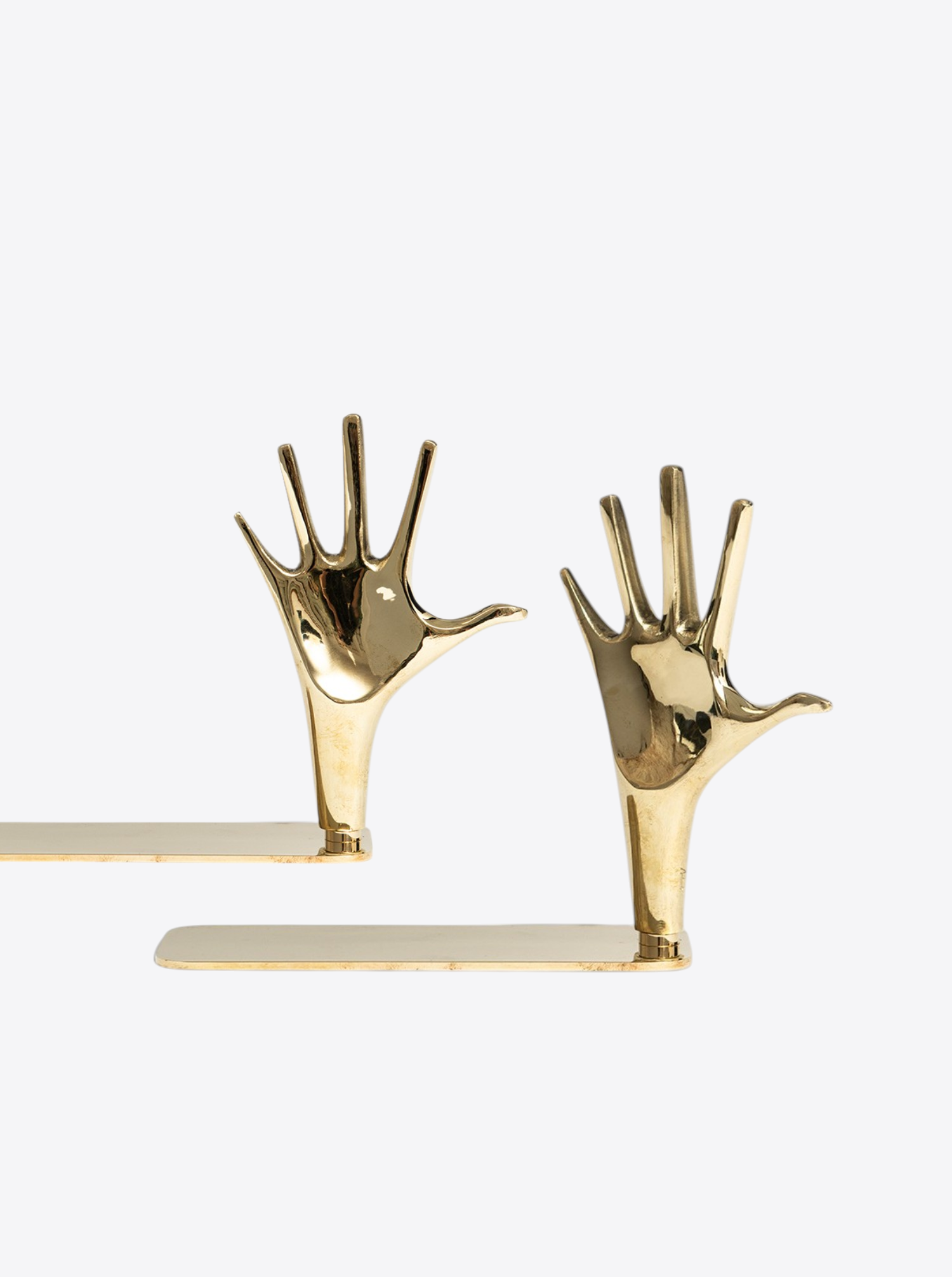 Bookend "Hand" 360 ° rotatable I polished brass